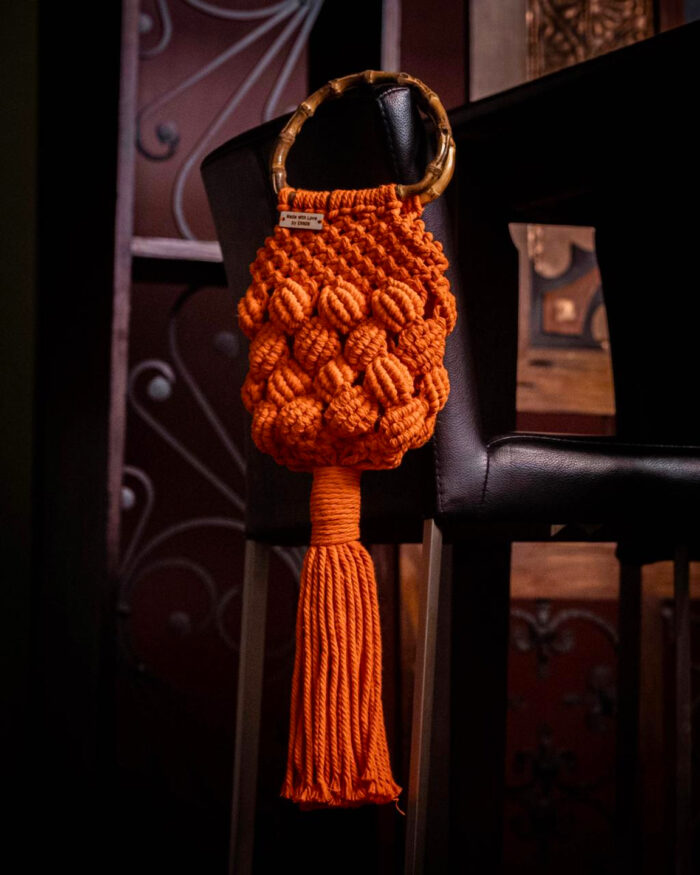 Bold Orange Macramé Pouch with Bamboo Handle and Tassel