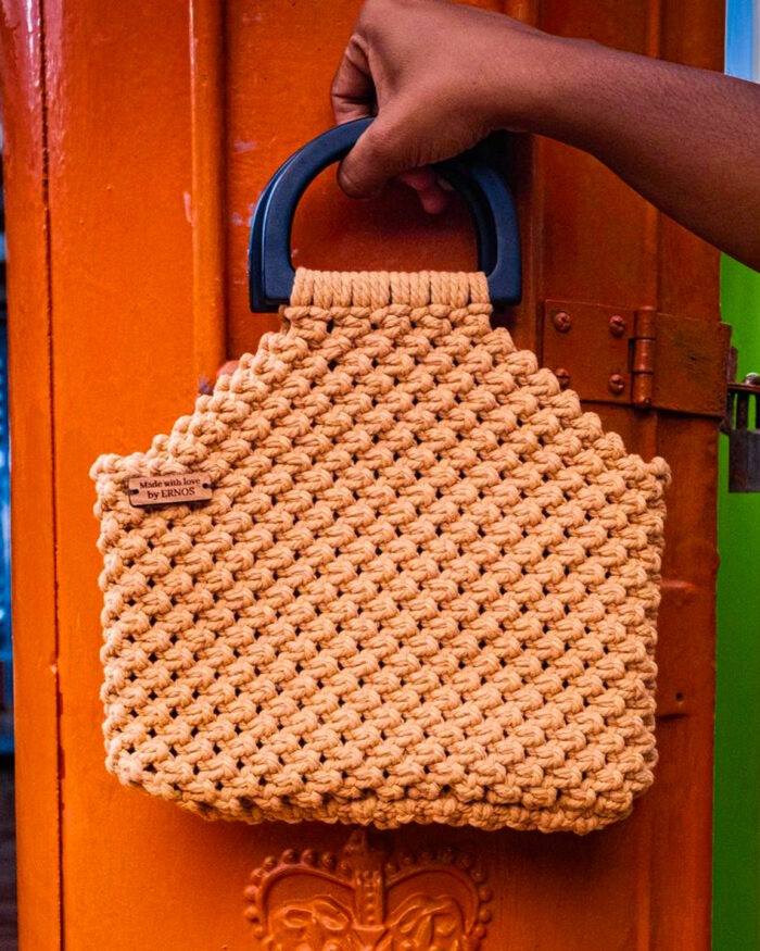 Warm Beige Macramé Handbag with Sleek Black Handle