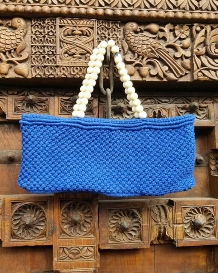 Blue Tote Bag with a White Beaded Handle